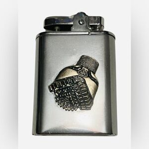 Rare 1950s Howard Hughes Tool Company Musical Pocket Lighter
